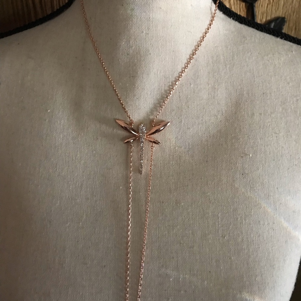 Beautiful rose gold plated dragonfly necklace.